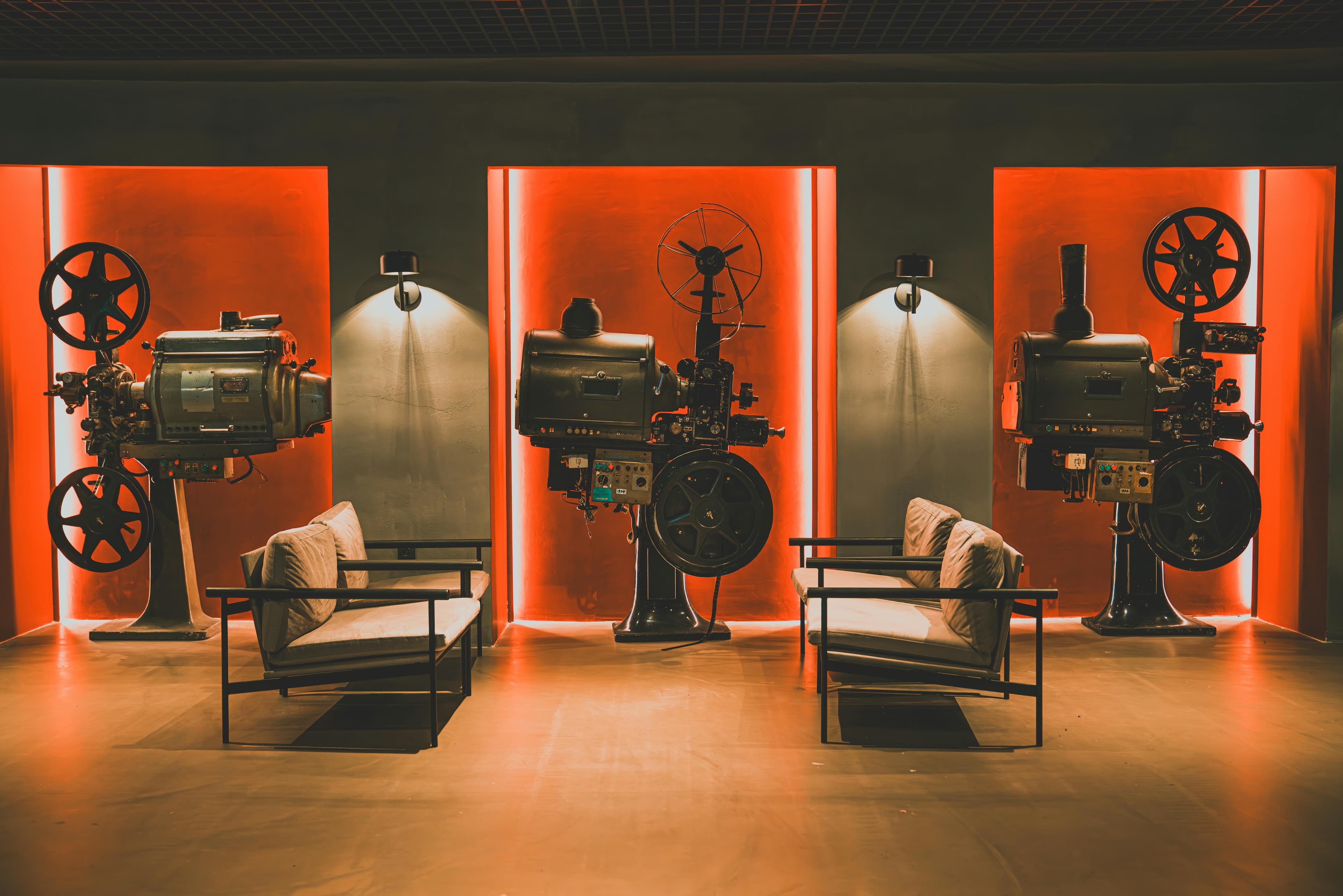 Vintage 16mm film projectors showcasing the history of documentary filmmaking